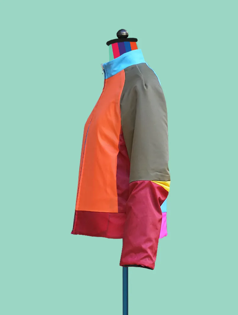 Reversible Bomber Jacket in Wools and Water Resistant Nylon.