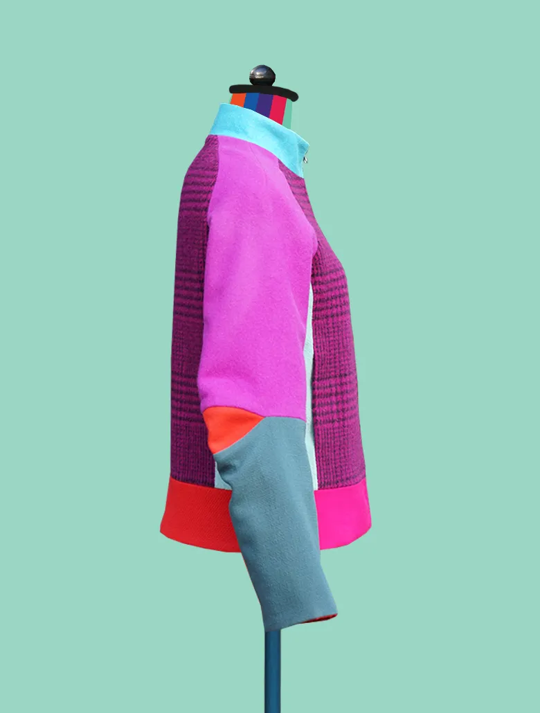 Reversible Bomber Jacket in Wools and Water Resistant Nylon.