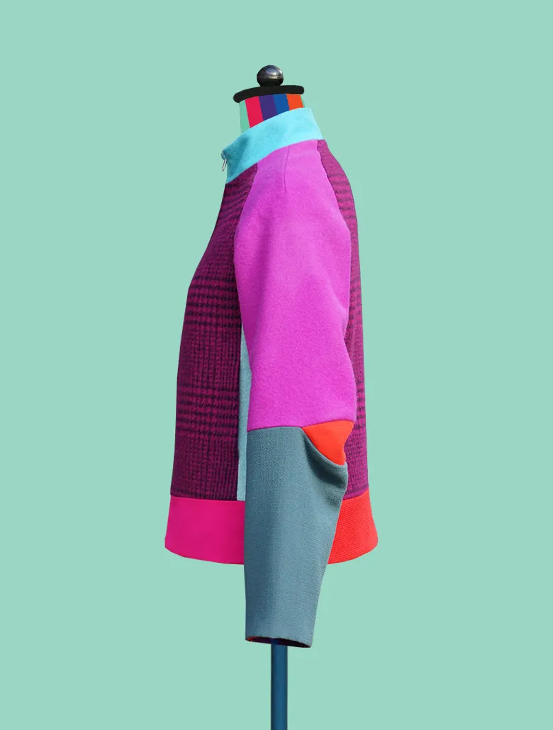 Reversible Bomber Jacket in Wools and Water Resistant Nylon.